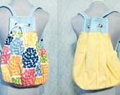 a Pop of Color Canvas Reversible Backpack
